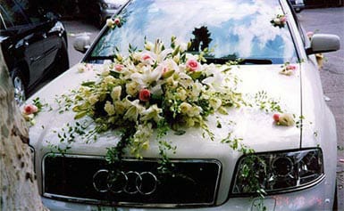 Vehicle Decor with white lily bouquet and light pink roses